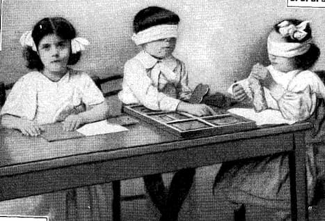 Children working on Sensorial materials in the Montessori classroom