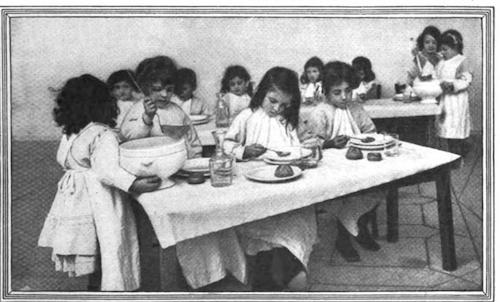 Children serving soup in the Montessori classroom