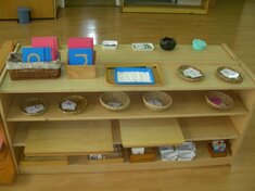 Montessori Language Materials on the shelf in a classroom